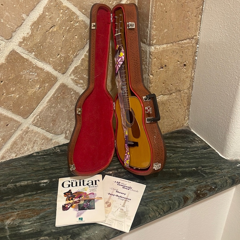 American Girl guitar in case with 2 instruction books, excellent condition